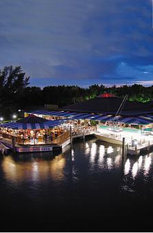 Exterior: night shot - Waterway Cafe in South Florida - Palm Beach Gardens, FL American Restaurants