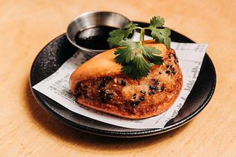 Product: limited edition: shrimp, scallion and ginger on a fried bun served with soy vinegar sauce - RAMEN-SAN Whisky Bar in Fulton Market - Chicago, IL Japanese Restaurants