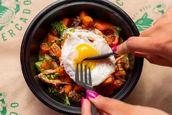 Product: GRILLED PORK, RED PEPPERS, FRIED EGG, PICKLED ONIONS, CILANTRO, SALSA VERDE FRITA. - Red Mesa Mercado in St. Petersburg, FL Mexican Restaurants