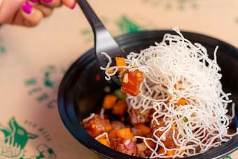 Product: YUZU PONZU, TOMATO, RED ONION, FUYU PERSIMMON, CILANTRO, LIME, BASIL, CRISPY NOODLES. - Red Mesa Mercado in St. Petersburg, FL Mexican Restaurants