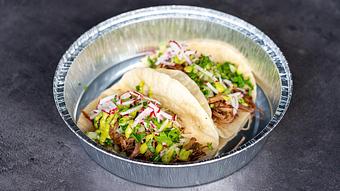Product: Two (2) slow roasted braised beef served on top of our house-made tortillas, topped with salsa verde frita, pico de gallo, pickled onions, and chopped cilantro. - Red Mesa Mercado in St. Petersburg, FL Mexican Restaurants
