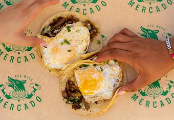Product: Fried eggs, queso fresco, cilantro-onion, salsa verde frita. - Red Mesa Mercado in St. Petersburg, FL Mexican Restaurants