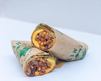 Product: Scrambled eggs, steak, chorizo, refried beans, fries, cheddar Jack cheese, pico de gallo. - Red Mesa Mercado in St. Petersburg, FL Mexican Restaurants