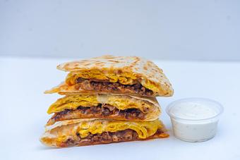 Product: House-made flour tortilla, scrambled eggs, sausage, bacon, chorizo, cheddar Jack cheese. - Red Mesa Mercado in St. Petersburg, FL Mexican Restaurants