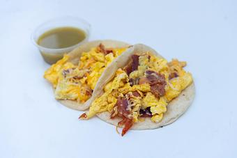 Product: Scrambled eggs, bacon, cheddar Jack cheese, salsa verde frita. - Red Mesa Mercado in St. Petersburg, FL Mexican Restaurants