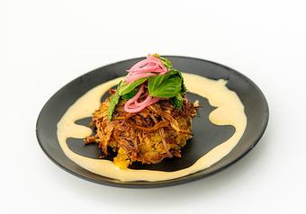 Product: Sweet plantain and yuca mofongo, brisket, garlic aoili, verde salad. - Red Mesa Restaurant in St Petersburg, FL Mexican Restaurants