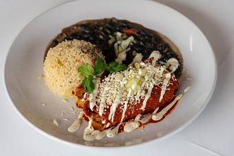Product: Chile guajillo, queso fresco, cilantro-onion, crema. Cilantro rice & black beans. - Red Mesa Restaurant in St Petersburg, FL Mexican Restaurants