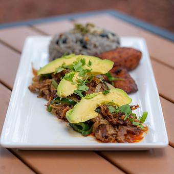 Product: Brisket, chile guajillo, poblano peppers, onions, avocado, cilantro. Congri & plantains. (MGF) - Red Mesa Restaurant in St Petersburg, FL Mexican Restaurants