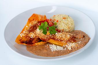 Product: Topped with chile morita sauce, queso fresco and pico de gallo. Served with refried beans and cilantro rice. - Red Mesa Restaurant in St Petersburg, FL Mexican Restaurants