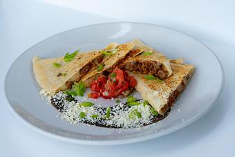 Product: Served with black bean sauce, queso fresco, pico de gallo and green onion. - Red Mesa Restaurant in St Petersburg, FL Mexican Restaurants