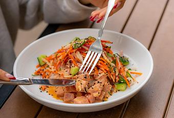 Product: Cucumber, serrano chile, radish, avocado, Nori, Sriracha Shoyu sauce over Jasmine rice. - Red Mesa Restaurant in St Petersburg, FL Mexican Restaurants