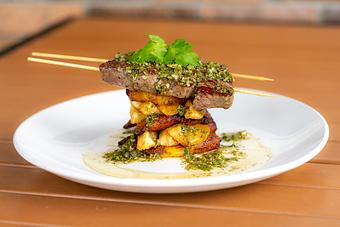 Product: Fried yuca, sweet plantains, chimichurri. - Red Mesa Restaurant in St Petersburg, FL Mexican Restaurants