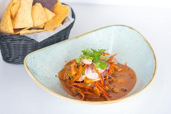 Product: Citrus marinated snapper, pulpo, bay shrimp, red onion, carrot, cilantro, serrano pepper, Cancha corn. Warm coconut chile morita mojito. - Red Mesa Restaurant in St Petersburg, FL Mexican Restaurants