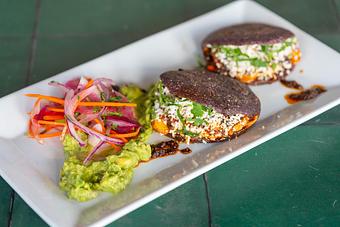 Product: Blue corn masa cakes, recado rojo grilled octopus, guacamole, salsa macha, queso fresco, watermelon radish slaw. - Red Mesa Restaurant in St Petersburg, FL Mexican Restaurants