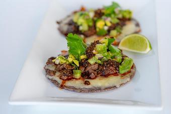 Product: Blue corn tortillas, Oaxaca cheese, avocado, tomatillo salsa, salsa macha. - Red Mesa Restaurant in St Petersburg, FL Mexican Restaurants