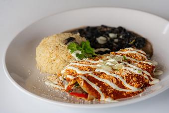 Product: Zucchini, corn, mushrooms, peppers, onion, spinach, jack cheese, ancho tomatillo, queso fresco, cilantro-onion, crema. Cilantro rice & black beans. - Red Mesa Restaurant in St Petersburg, FL Mexican Restaurants