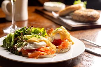 Product: Eggs Norwegian with hollandaise and castsmo smoked salmon on a toasted English muffin. - Roxy Bar in TriBeCa - New York, NY Bars & Grills