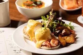 Product: Lobster Benedict with hollandaise and poached main lobster on a toasted English muffin. - Roxy Bar in TriBeCa - New York, NY Bars & Grills