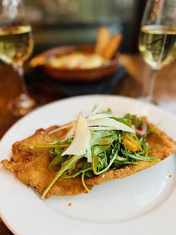 Product: CHICKEN MILANESA | breaded chicken cutlet, parsley & garlic, arugula, Idiazábal cheese - Socarrat Paella Bar - Chelsea in Chelsea - New York, NY Spanish Restaurants