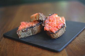 Product: PAN CON TOMATE | fresh tomato spread, olive oil, garlic, country toast - Socarrat Paella Bar - Chelsea in Chelsea - New York, NY Spanish Restaurants