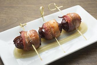 Product: DÁTILES | bacon wrapped dates stuffed with valdeón cheese, almonds, roasted apple purèe - Socarrat Paella Bar - Chelsea in Chelsea - New York, NY Spanish Restaurants