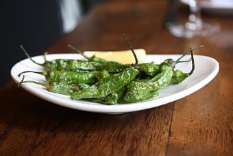 Product: PIMIENTOS DE PADRÓN AL LIMÓN | fried shishito peppers, lemon zest, sea salt - Socarrat Paella Bar - Chelsea in Chelsea - New York, NY Spanish Restaurants