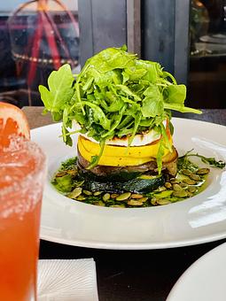Product: NAPOLEÓN DE VERDURAS | layered eggplant, mushrooms, zucchini, tomato, goat cheese, basil oil, pumpkin seeds - Socarrat Paella Bar - Chelsea in Chelsea - New York, NY Spanish Restaurants