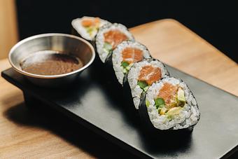 Product: faroe island salmon is rolled with asparagus, mild meyer lemon, and avocado. served with side of wasabi soy. available in 5 or 10 pieces. - Sushi San - Reservations in River North - Chicago, IL Japanese Restaurants