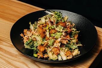 Product: "croutons" made from our fan-favorite crispy rice are the finishing touch on a salad made from baby bok choy, edamame, daikon sprouts, chopped roasted cashews, and finished with a sweet and savory cashew vinaigrette - Sushi San - Reservations in River North - Chicago, IL Japanese Restaurants