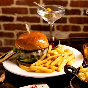 Product: The Django | Jazz Club and Restaurant in Downtown NYC | The Django Burger - served with onion jam, cheddar, lettuce, tomato, and black pepper mayo. Make it an Impossible Burger +4. - The Django in TriBeCa - New York, NY American Restaurants