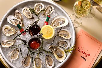 Product: The Django | Jazz Club and Restaurant in Downtown NYC | East Coast Oysters at The Django. Sold by the dozen or half dozen. - The Django in TriBeCa - New York, NY American Restaurants
