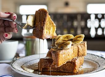 Product: Brioche French Toast with banana, brown sugar, maple syrup on top! - The Shed Restaurant- Plainview in The Shops at Country Pointe Beechwood - Plainview, NY American Restaurants