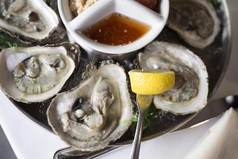 Product: Local Blue Point Oysters - The Waters Edge at Giovanni's in Darien, CT Steak House Restaurants