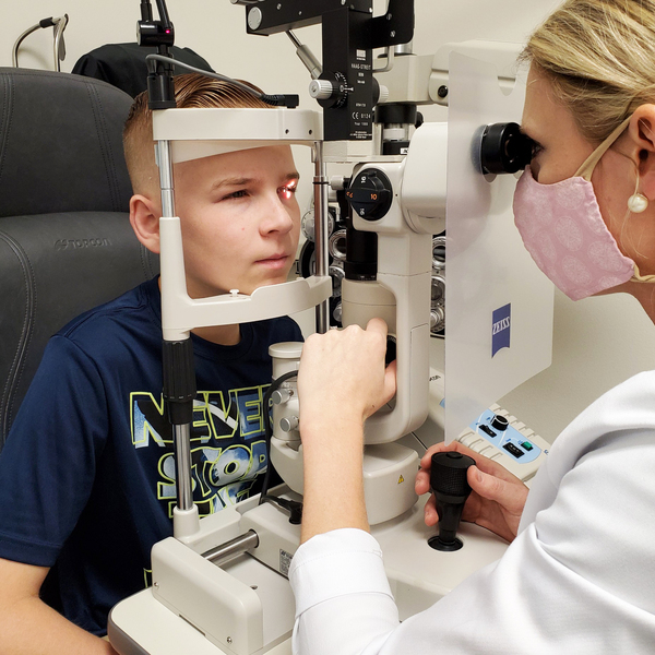 Doctor performing an eye exam at True Eye Experts Lutz. - Photos of Our Business -  True Eye Experts of Lutz