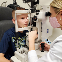 Doctor performing an eye exam at True Eye Experts Lutz. - Photos of Our Business -  True Eye Experts of Lutz
