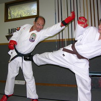 Rocky sparring with student - Photos of Our Business -  Rocky's Dojo & Gym