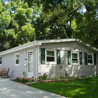 New siding and double hung windows replaced on home in Jackson Wisconsin 