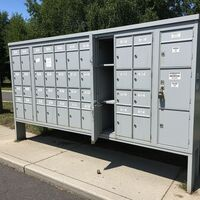 Outdoor commercial multi-unit cluster mailbox system by Fishkill Locksmith. Call Us (845) 599-0885